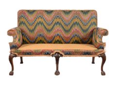 A WALNUT SETTEE. IN GEORGE II STYLE