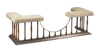 A STEEL AND GILT METAL CLUB FENDER IN VICTORIAN STYLE