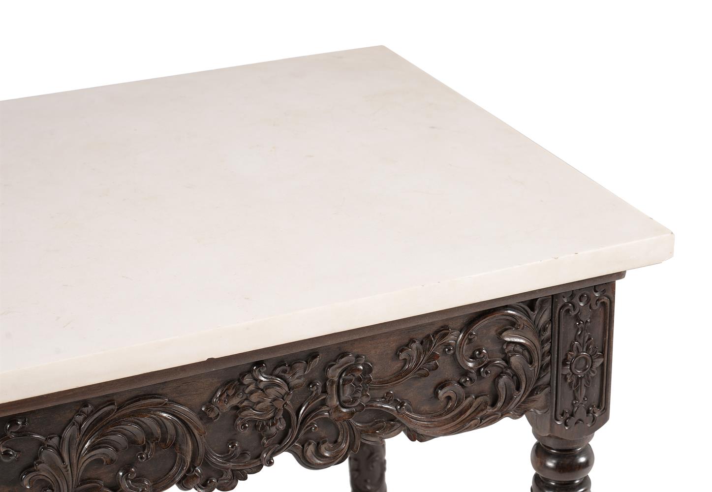 Y A PAIR OF ANGLO INDIAN EBONY CONSOLE TABLES WITH LATER MARBLE TOPS - Image 3 of 3