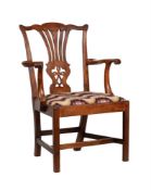 A GEORGE III MAHOGANY ARMCHAIR