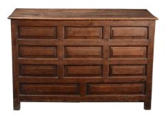 A GEORGE III PANELLED OAK CHEST