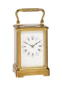 A FRENCH SMALL LACQUERED BRASS CARRIAGE TIMEPIECE
