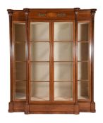 A MAHOGANY DISPLAY CABINET IN EMPIRE TASTE