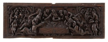 A CARVED OAK PANEL