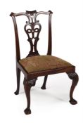 A GEORGE II CARVED MAHOGANY SIDECHAIR