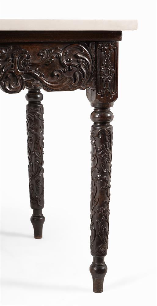 Y A PAIR OF ANGLO INDIAN EBONY CONSOLE TABLES WITH LATER MARBLE TOPS - Image 2 of 3