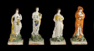 A STAFFORDSHIRE PEARLWARE SET OF THE FOUR SEASONS