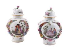 A PAIR OF DRESDEN FLOWER-ENCRUSTED BALUSTER VASES AND DOMED COVERS