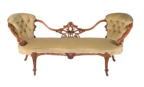 A VICTORIAN WALNUT AND UPHOLSTERED SOFA