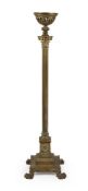 A BRASS STANDARD OIL LAMP IN NEOCLASSICAL TASTE