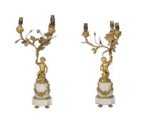 A PAIR OF FRENCH ORMOLU AND WHITE MARBLE THREE-LIGHT CANDELABRA, IN LOUIS XVI STYLE