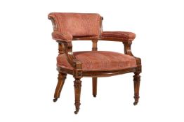 A WALNUT, EBONISED, AND YEW DESK CHAIR
