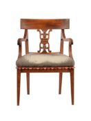 A CONTINENTAL STAINED ASH OPEN ARMCHAIR