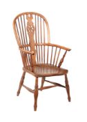 A CHESTNUT, ELM AND ASH WINDSOR ARMCHAIR
