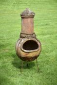 A MODERN TERRACOTTA CHIMENEA