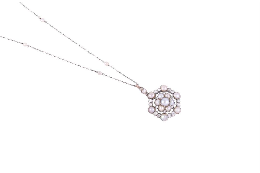 A LATE VICTORIAN DIAMOND AND HALF PEARL PENDANT WITH EARLY 20TH CENTURY PEARL CHAIN - Image 1 of 3
