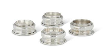 A PAIR OF QUEEN ANNE BRITANNIA STANDARD SILVER SHAPED CIRCULAR SALTS