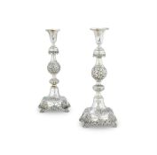 A PAIR OF RUSSIAN SILVER SABBATH CANDLESTICKS