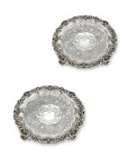 A PAIR OF GEORGE III SILVER SHAPED CIRCULAR SALVERS