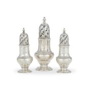 A SET OF THREE GEORGE II SILVER BALUSTER CASTERS