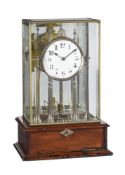 AN ENGLISH NICKEL-PLATED BRASS AND MAHOGANY ELECTRIC TABLE TIMEPIECE