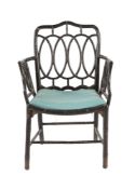A REGENCY BLACK LACQUERED BAMBOO ARMCHAIR