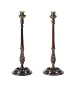 A PAIR OF MAHOGANY AND BRASS MOUNTED TABLE CANDLESTICKS IN SCOTTISH 18TH CENTURY TASTE