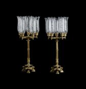 A PAIR OF FRENCH BRASS CANDELABRA IN EMPIRE TASTE