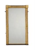 A GEORGE IV GILTWOOD OVERMANTEL WALL MIRROR