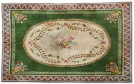 A MACHINE WOVEN CARPET OF AUBUSSON STYLE, DESIGNED BY OLIVER MESSEL