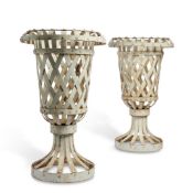 A PAIR OF CREAM PAINTED URN SHAPED BRAZIERS