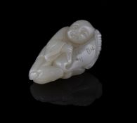 A Chinese pale celadon jade 'Boy' pendant
