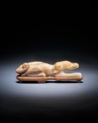 A Chinese carved model of a dog