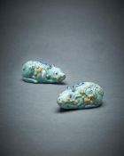 A pair of Dutch Delft light blue glazed models of 'tree shrews'