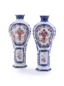 A pair of Chinese famille rose vases