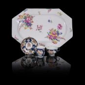 A BOW SHAPED OCTAGONAL SERVING DISH OR TUREEN STAND