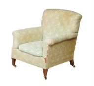 A WALNUT AND UPHOLSTERED ARMCHAIR IN VICTORIAN STYLE
