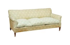 A WALNUT AND UPHOLSTERED SOFA