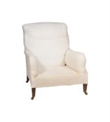 A VICTORIAN WALNUT AND WHITE CALICO UPHOLSTERED ARMCHAIR