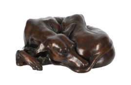 λ JONATHAN WYLDER (b. 1957), A BRONZE LIMITED EDITION MODEL OF A RECUMBENT WHIPPET