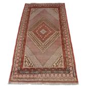 A PERSIAN RUG