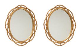 A PAIR OF GILTWOOD OVAL WALL MIRROR