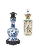 A DUTCH DELFT BLUE AND WHITE GARLIC-NECK VASE
