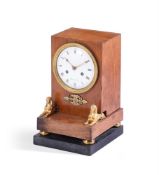 AN EMPIRE MAHOGANY AND GILT METAL MOUNTED MANTEL CLOCK, BY SIROST