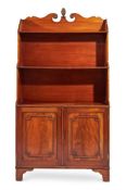 Y A REGENCY MAHOGANY WATERFALL OPEN BOOKCASE, CIRCA 1820