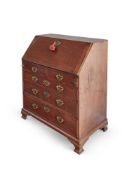 A GEORGE III MAHOGANY BUREAU, CIRCA 1770