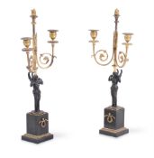 A PAIR OF EMPIRE BRONZE AND GILT METAL TWIN-LIGHT CANDELABRA, CIRCA 1805
