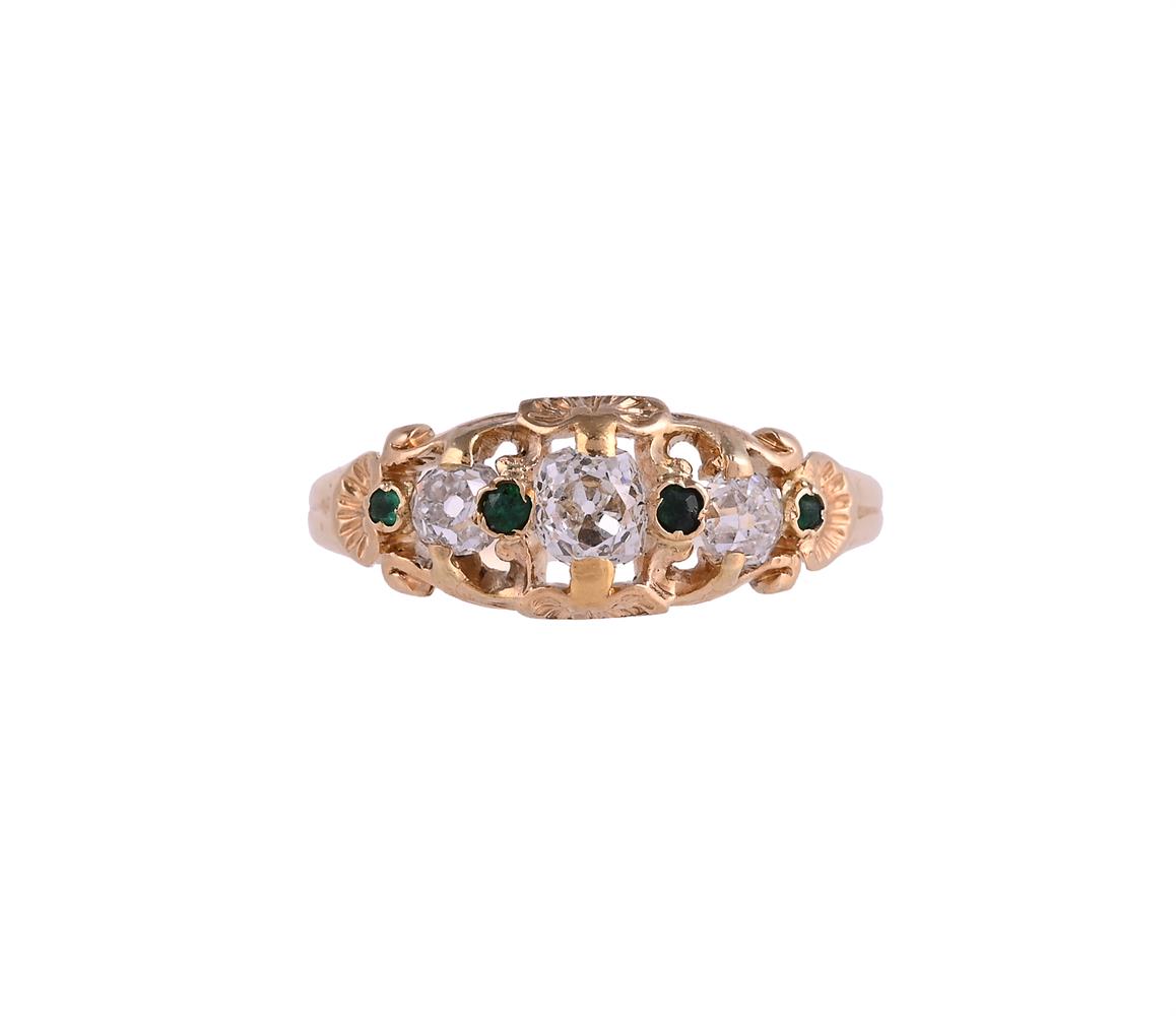 AN EMERALD AND DIAMOND RING