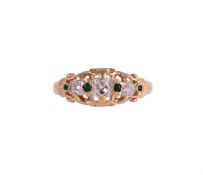 AN EMERALD AND DIAMOND RING