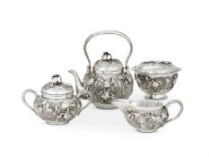 A JAPANESE SILVER THREE PIECE TEA SET